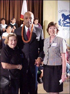 Secretary Paige greets reading expert Marion Jones (left) and Carson Elementary Principal Sue Di Julio during his visit to Los Angeles.