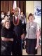 Secretary Paige greets reading expert Marion Jones (left) and Carson Elementary Principal Sue Di Julio during his visit to Los Angeles.